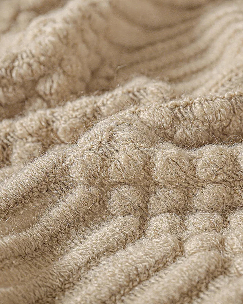 Close-up of the bobble and rib knit texture