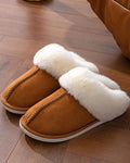 Chestnut faux suede scuff slippers with a fluffy collar on a timber floor
